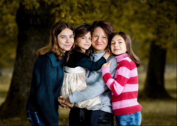 Mother and daghters posing